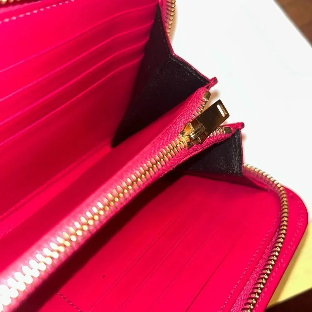 Authentic Saint Laurent Pink Zippy Wallet